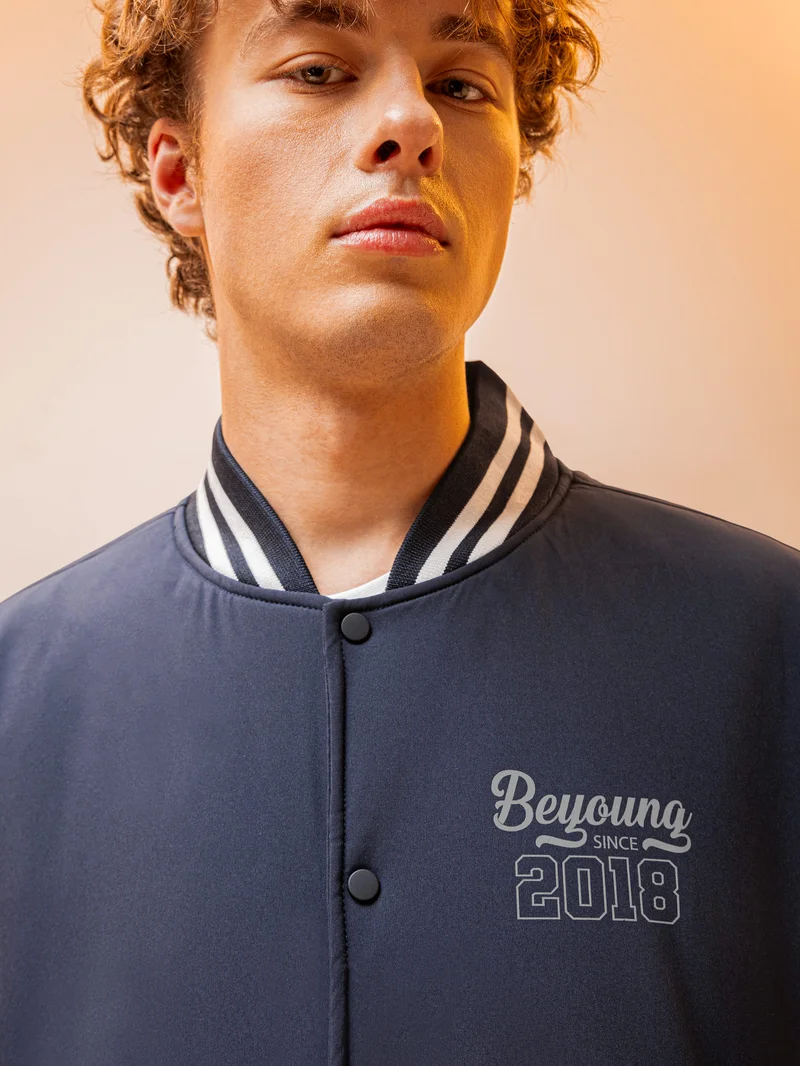 Beyoung Navy Blue Solid Varsity Jacket for Men