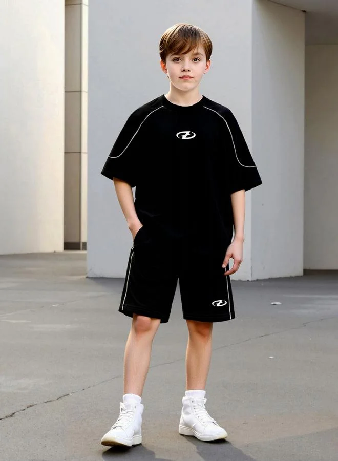 تايك تو طقم من تيشيرت بطبعة جرافيك وشورت للأولاد