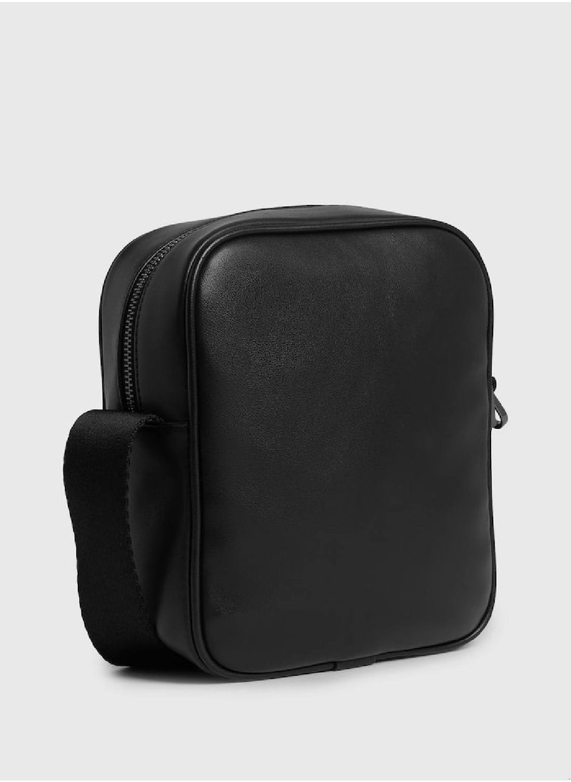 CALVIN KLEIN - Men's Small Reporter Bag -  recycled and water-based faux leather exterior, Black - Image 1