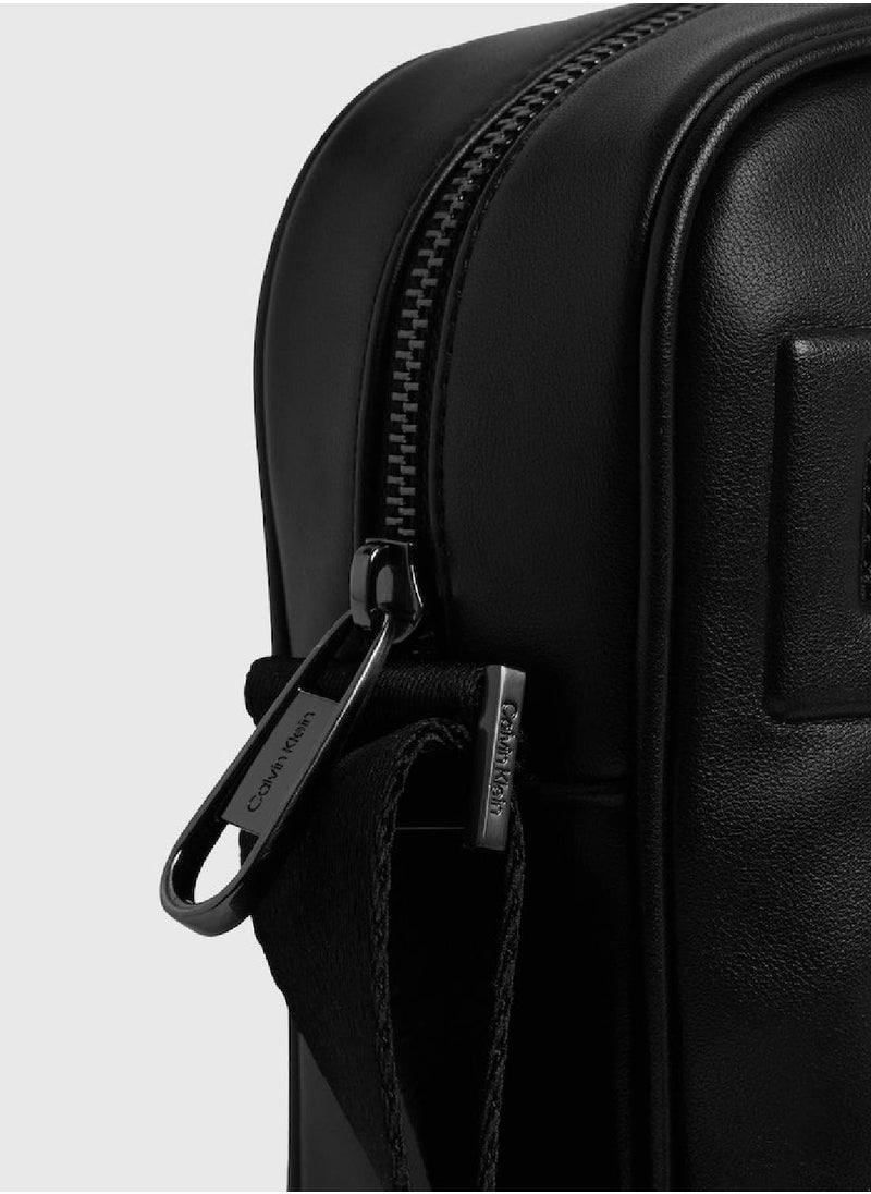CALVIN KLEIN - Men's Small Reporter Bag -  recycled and water-based faux leather exterior, Black - Image 1