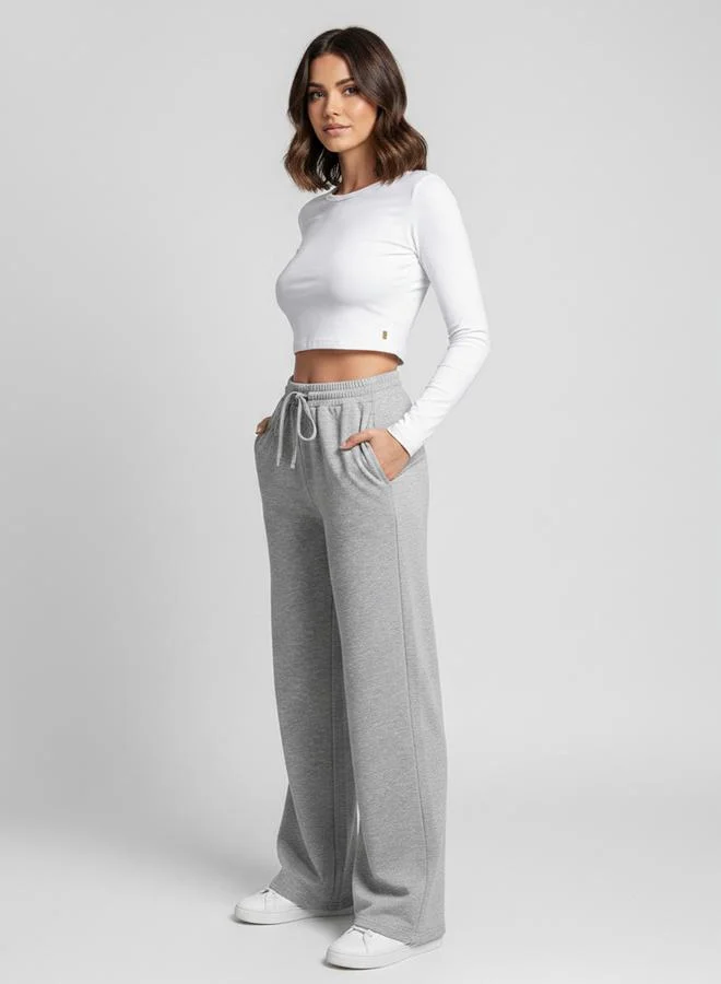 تايك تو Grey Solid Relaxed Wide Leg Joggers By Gravt
