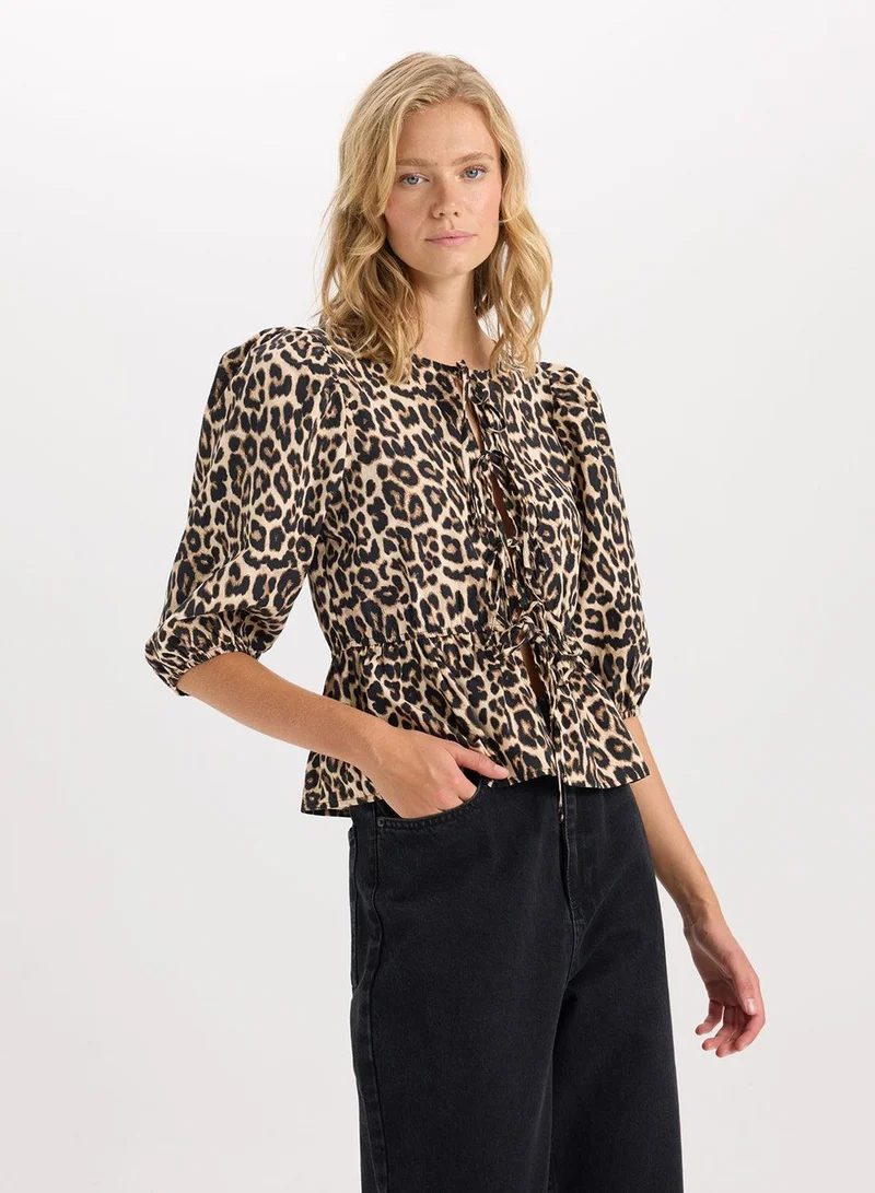 DeFacto  Fitted Round Neck Leopard Print Front-Tied Poplin Long Sleeve Blouse  | Best Price UAE