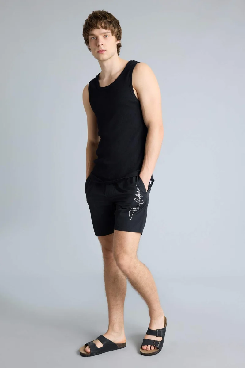 Defacto  Regular Fit Mesh Lined Short Swim Shorts for Men | Best Price UAE