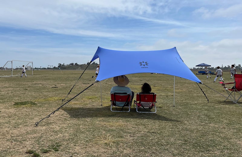 Neso Sidelines 1 Sports Tent - Lightweight and Portable Sun Shelter and Shade Tent for Outdoor Activities - Patented Reinforced Corners - UPF 50+ Sun Protection - 5.5 ft Tall, 7 x 4.5 ft - Periwinkle - Image 1