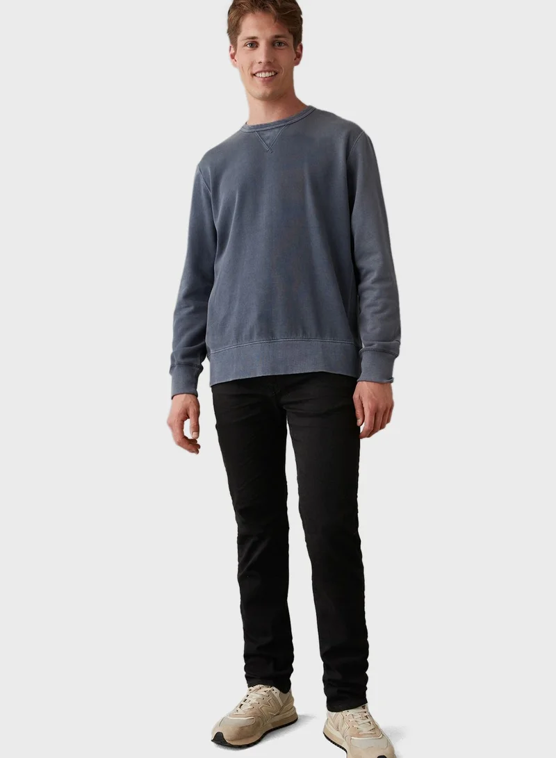 امريكان ايجل Rinse Wash Slim Fit Airflex+ Jeans