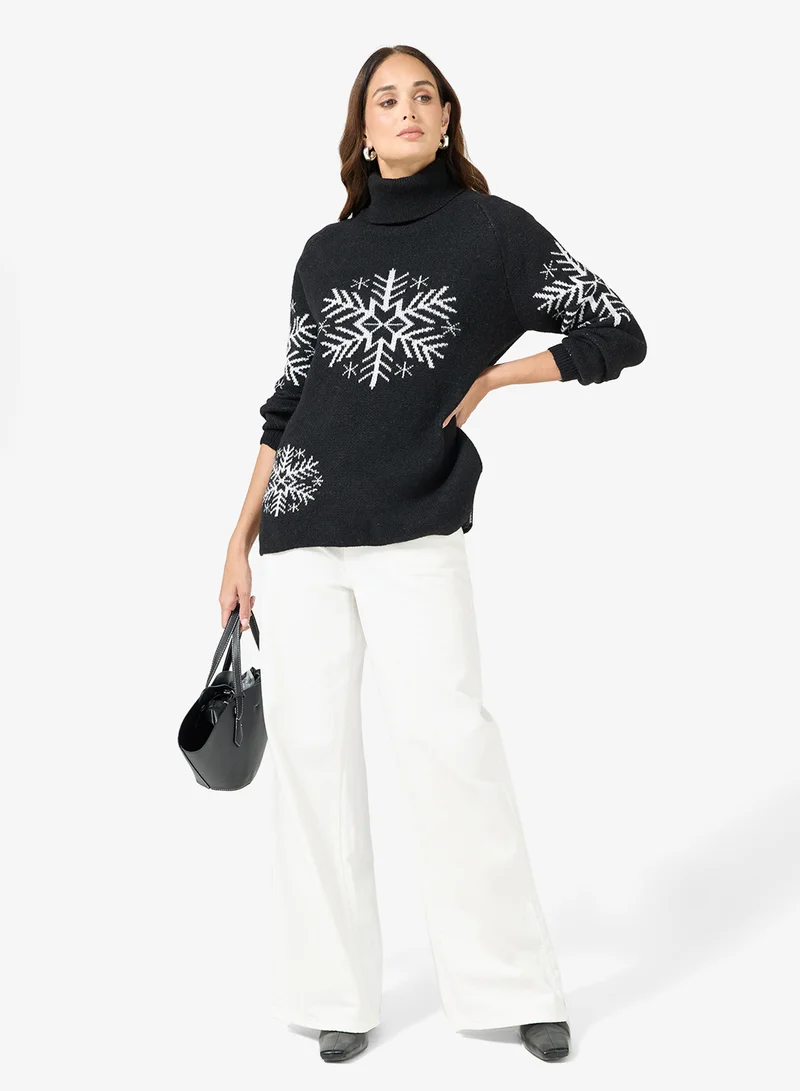 ايلا كنزة بياقة سلحفاة مطبوعة