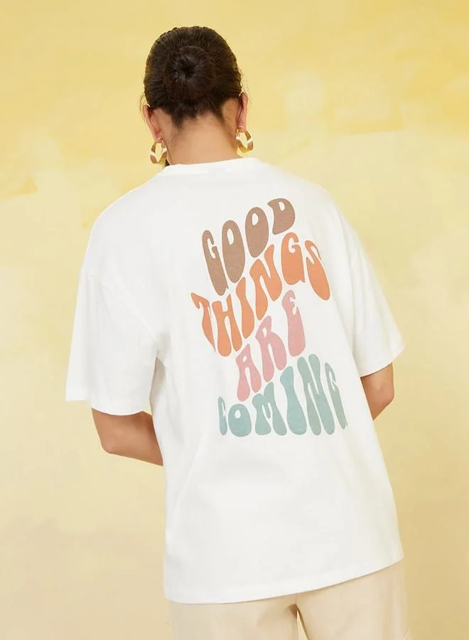 ستايلي Oversized Good Things Are Coming Slogan Longline T-Shirt