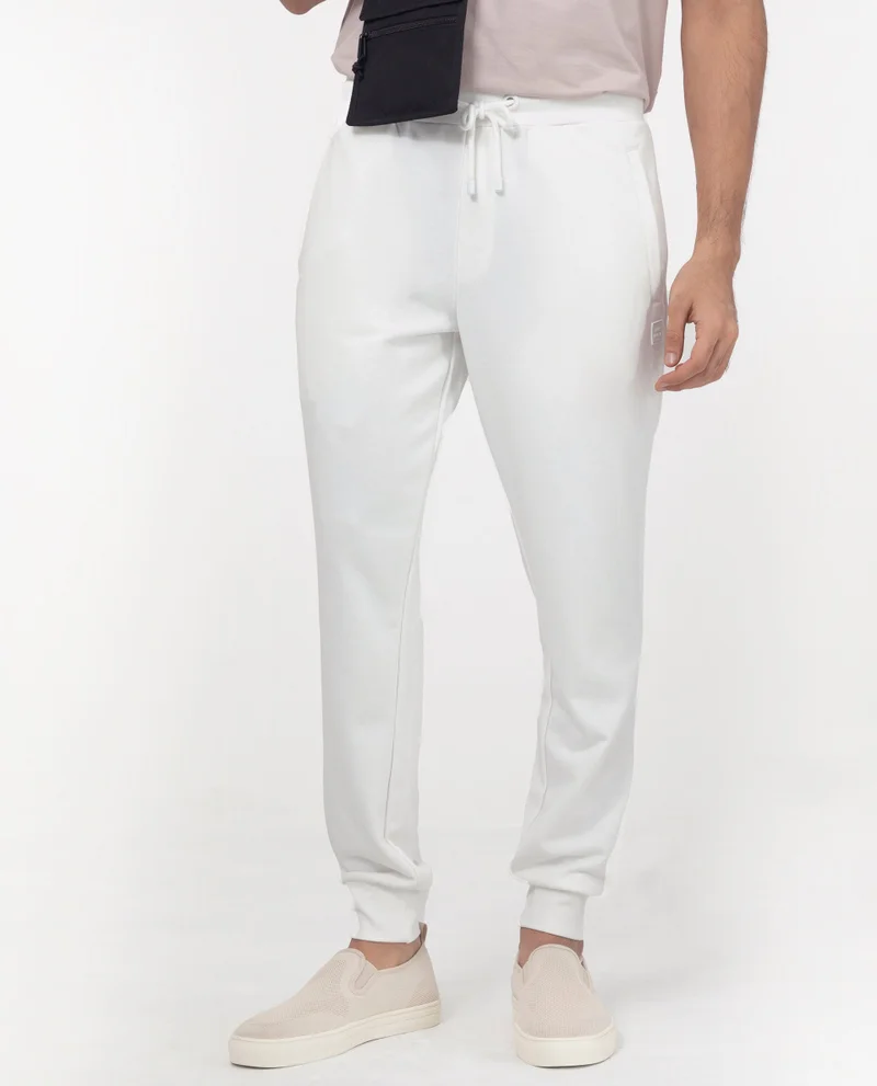 Rare Rabbit Rare Rabbit Men's Toyo Off White Cotton Polyester Fabric Drawstring Closure Regular Fit Mid Rise Trackpant