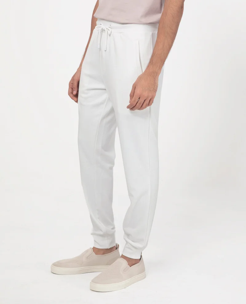 Rare Rabbit Rare Rabbit Men's Toyo Off White Cotton Polyester Fabric Drawstring Closure Regular Fit Mid Rise Trackpant
