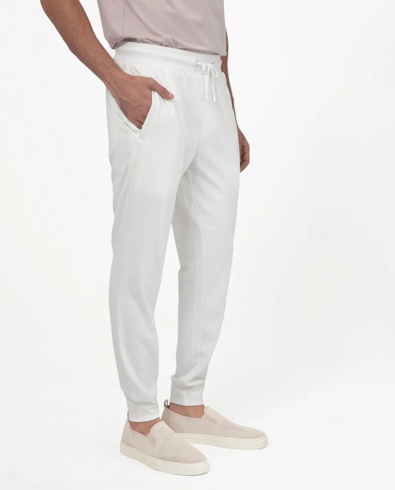 Rare Rabbit Rare Rabbit Men's Toyo Off White Cotton Polyester Fabric Drawstring Closure Regular Fit Mid Rise Trackpant