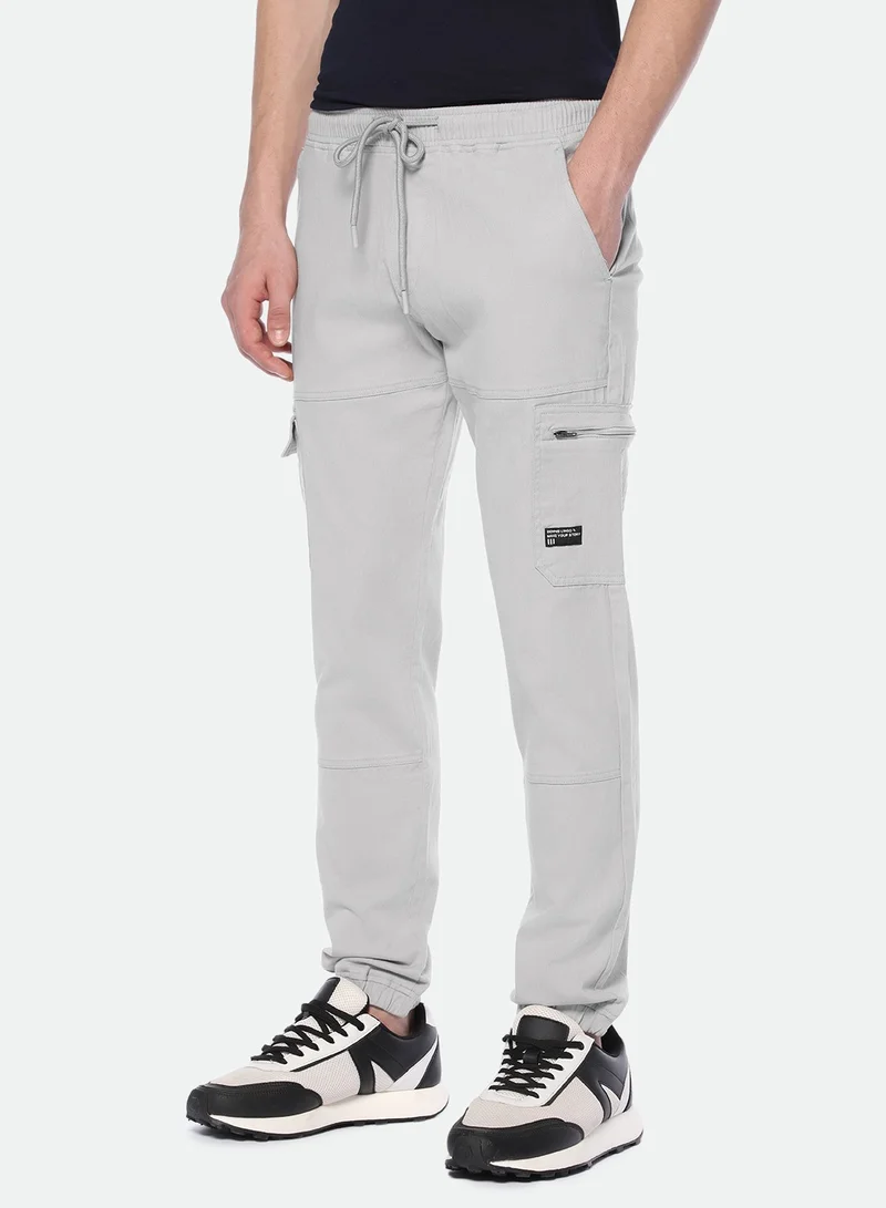 دينيس لينغو Relaxed Fit Light Grey Men's Cotton Lycra Solid Cargo Trouser, Mid Rise, Full Length, Casual,