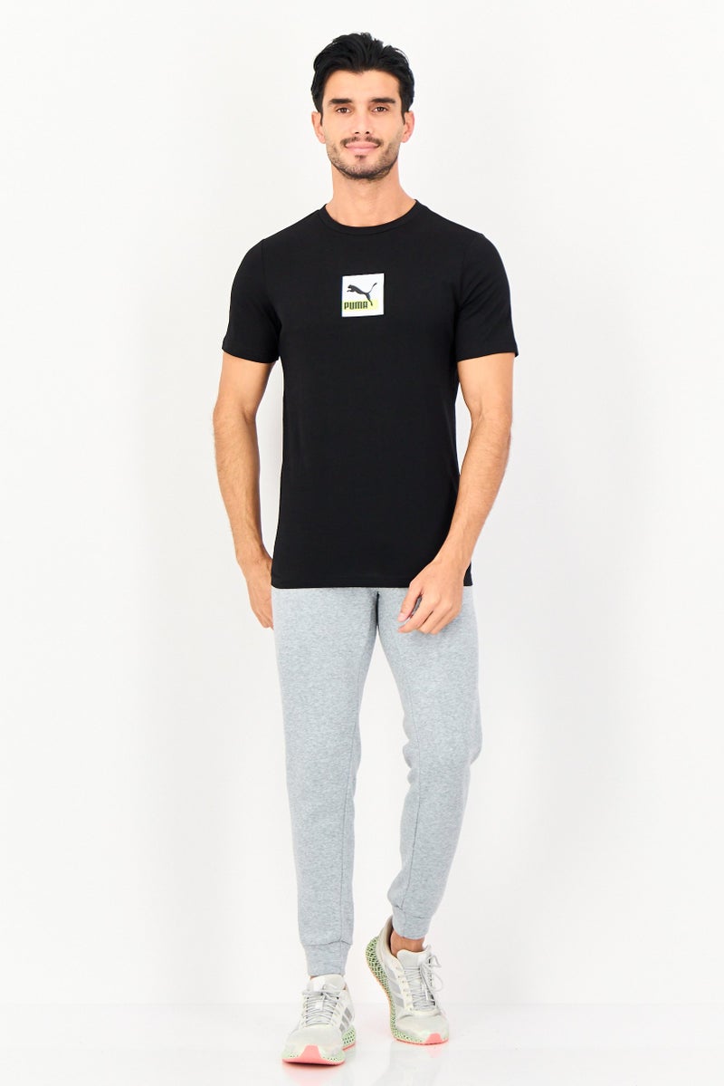 PUMA تي شيرت رياضي للرجال بأكمام قصيرة مناسب في الهواء الطلق، أسود - Image 4