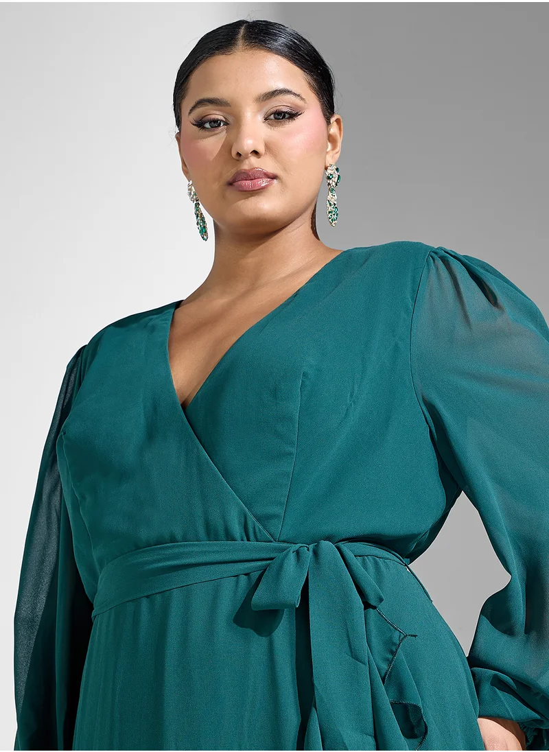 Khizana Plus size surplice neck dress with ruffle hem