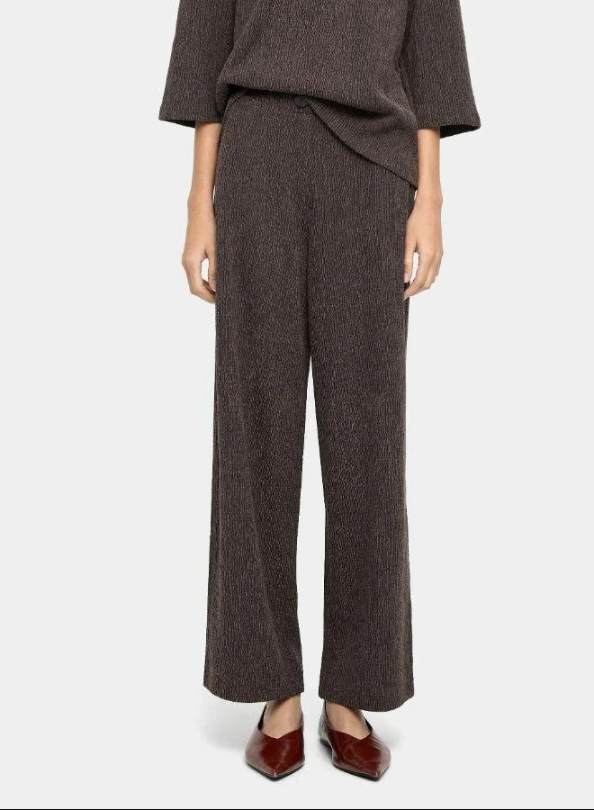 Parfois Brown Trousers with pockets and texture for Women | Best Price UAE