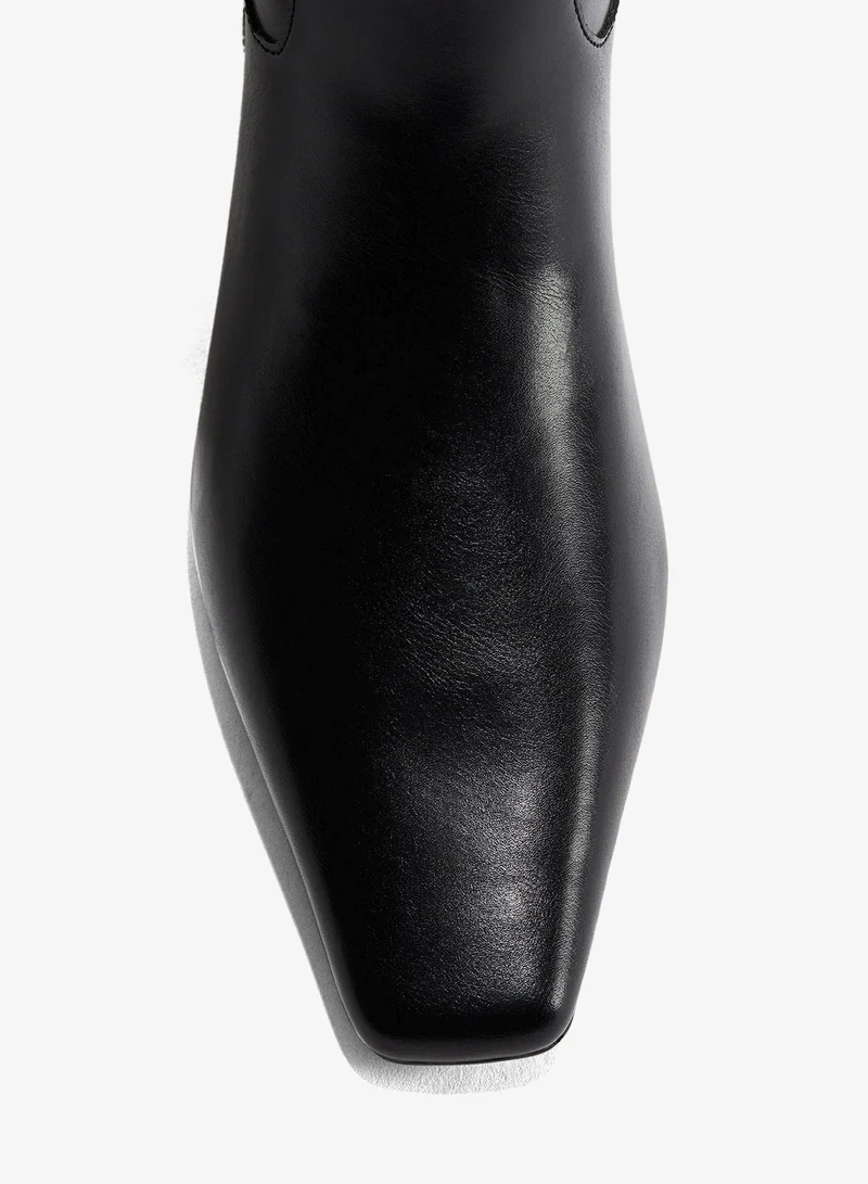 اتش اند ام بوت بطول يصل للركبة