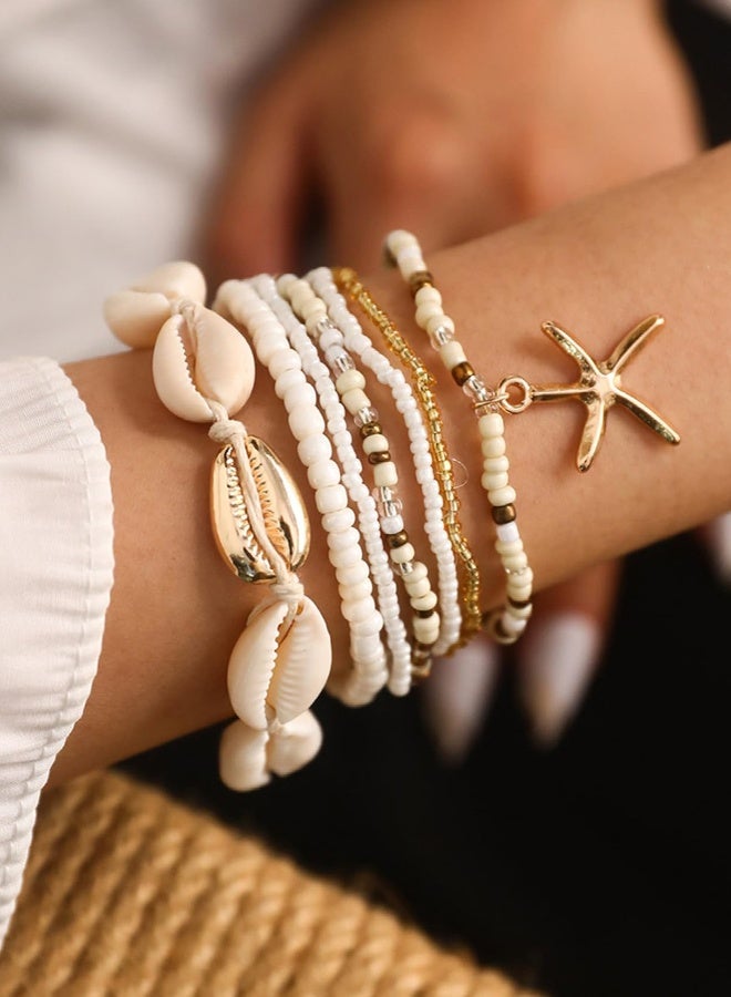 7 قطع من الأساور المزينة بالخرز على الطراز البوهيمي أساور شاطئية متعددة الطبقات أساور من الصدف والأرز والمرجان قلادة على شكل نجم البحر للنساء ملابس يومية مناسبة للعطلات والسفر والحفلات هدايا - Image 2