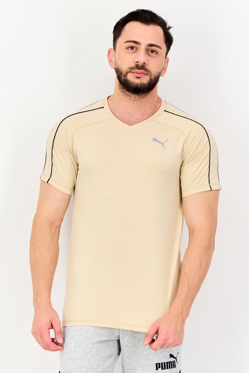 PUMA Men Sportswear Fit Short Sleeve Outdoor T-shirt, Cream - Image 1