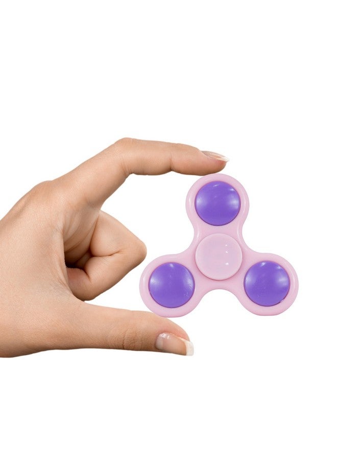 بريمسونس لعبة مكتب بريمسونز® هاند سبينر - لعبة حسية عالية السرعة تدور بسلاسة بالإصبع لتخفيف التوتر للأطفال والكبار - هدية لحفلات أعياد الميلاد - بلاستيك - وردي مع محمل أرجواني - Image 4