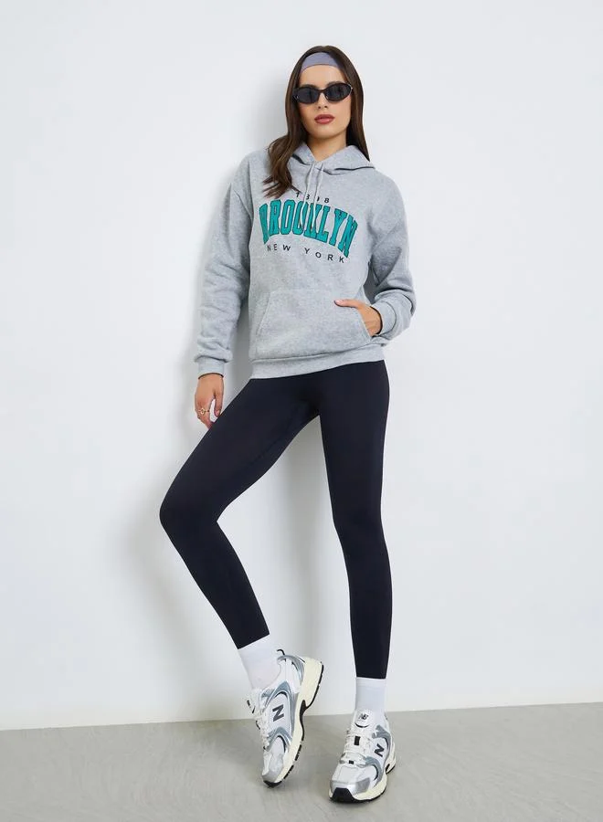 Styli Brooklyn Print Grey Hoodie with Front Pocket