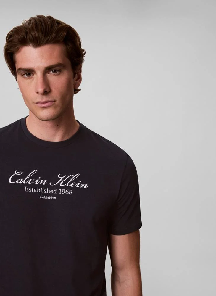 Calvin Klein Jeans  Script Logo Graphic T-Shirt for Men | Best Price UAE