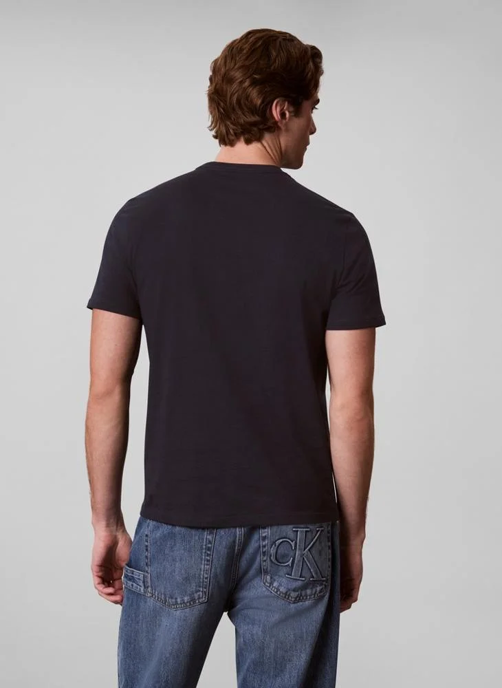 Calvin Klein Jeans  Script Logo Graphic T-Shirt for Men | Best Price UAE