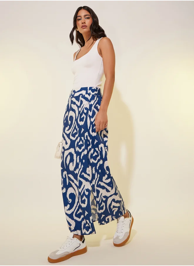 ستايلي All-Over Print A-Line Maxi Skirt with Side Slit