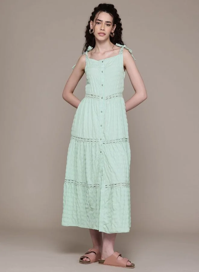 Women Fit and Flared Solid Tie-up Neck Sleeveless Maxi Dress