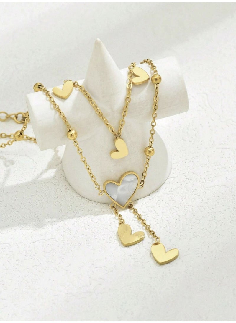 ڤيا خلخال فاخر من الفولاذ المقاوم للصدأ مطلي بالذهب، بتصميم طبقتين مزين بحجر راينستون وقلب وزهرة بلمسة أنثوية راقية. - Image 2