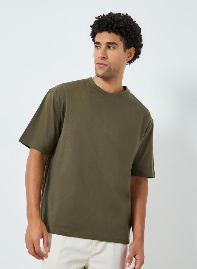 Styli Men Olive Green Graphic Print Oversized T-Shirt - Image 1