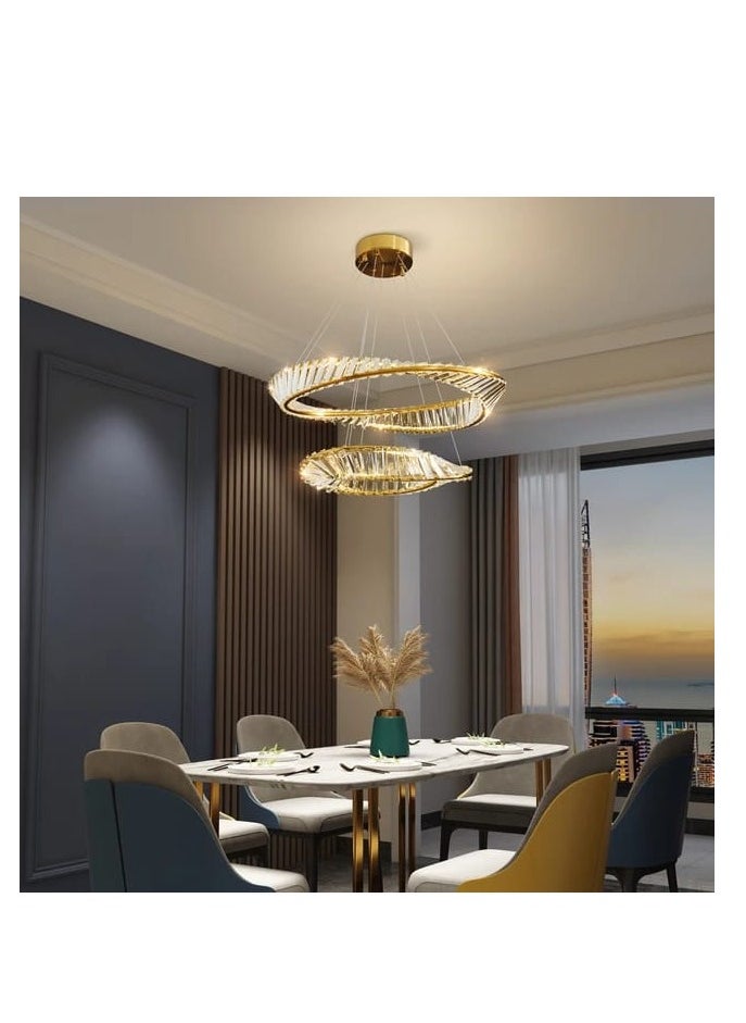 Modern LED crystal chandelier, two rings, sparkling gold color and 3 lighting colors from TEC Light for modern lighting.
