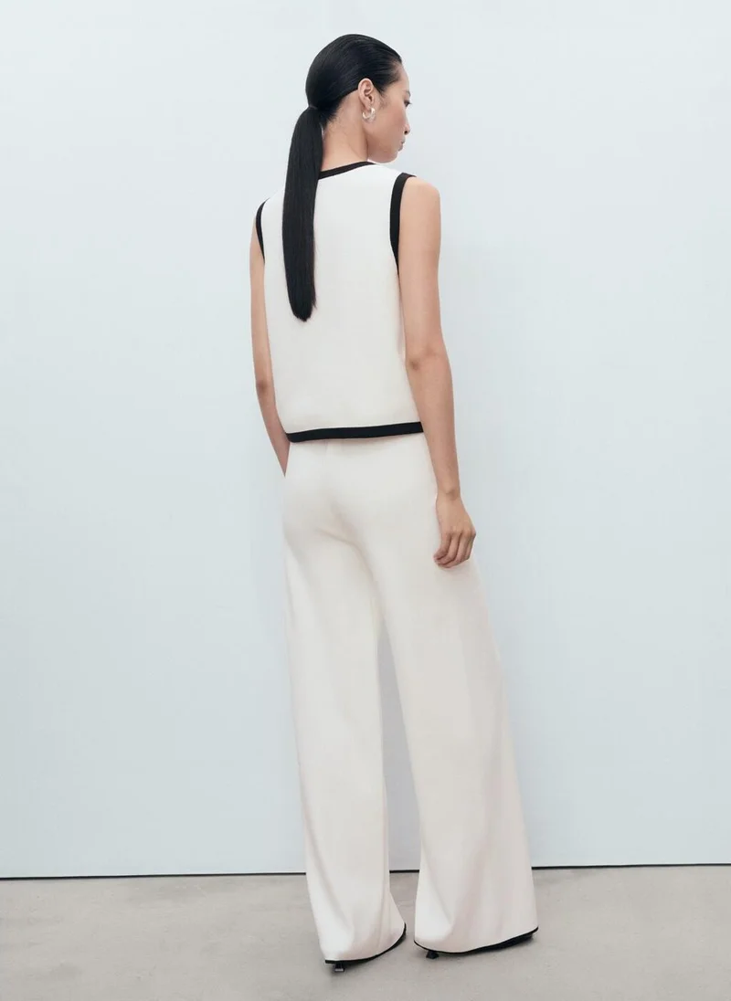 MANGO Contrasting low-rise knitted trousers