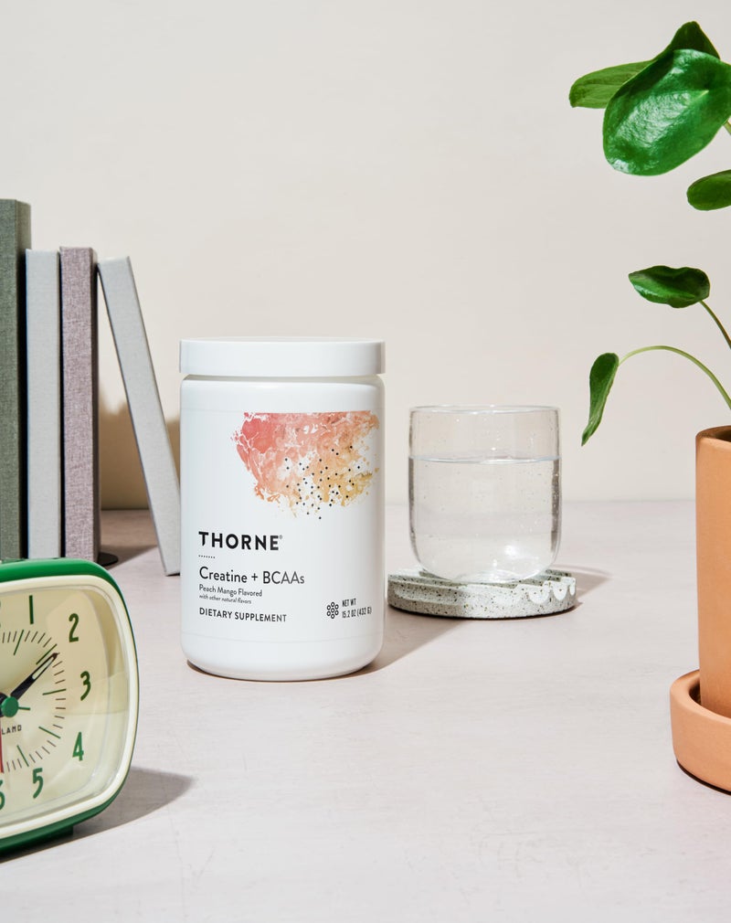 Thorne Creatine + BCAAs Peach Mango Flavored with other natural flavors DIETARY SUPPLEMENT NET WT 15.2 OZ (432 G) - Image 4