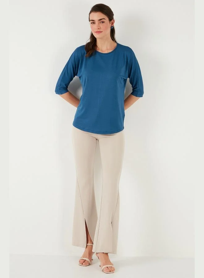 ليلا بلوزة نسائية بأكمام ترافكار وياقة دائرية من ليلا