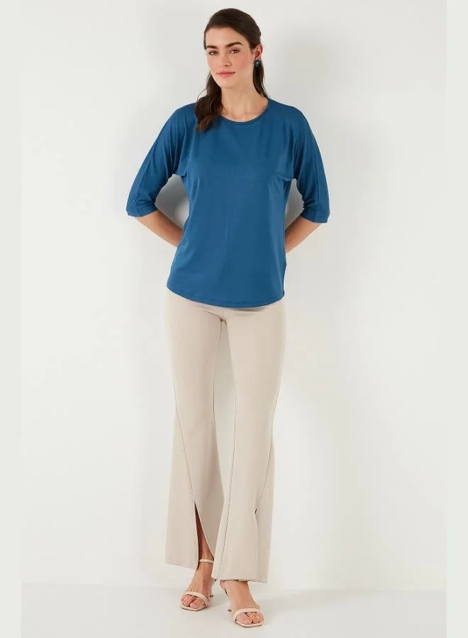 ليلا بلوزة نسائية بأكمام ترافكار وياقة دائرية من ليلا