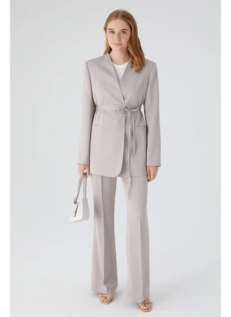 مانوكا Satin Flared Leg Trousers Stone
