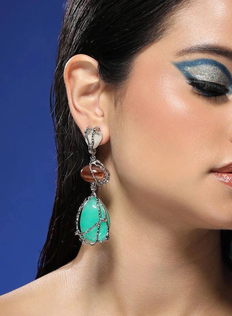 سوهي أقراط نسائية فضية اللون بتصميم دمعة مرصعة بحجر صناعي