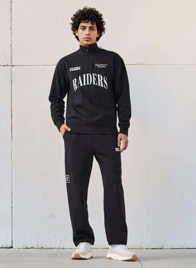 SP Characters Men Relaxed Fit Flexi Waist Track Pants with NFL Print