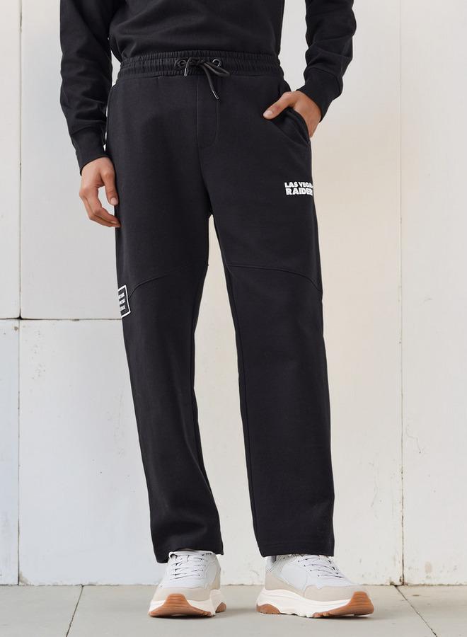 SP Characters Men Relaxed Fit Flexi Waist Track Pants with NFL Print - Image 1