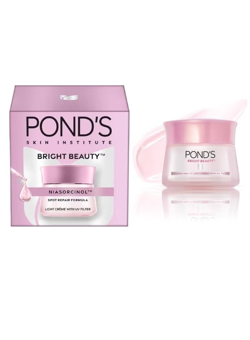 Pond's POND’s Bright Beauty Light Cream 50g | Bright Beauty Niasorcinol Cream Spot Repair Formula | Vitamin B3 Active | Fades Dark Spots, Brightens & Evens Skin Tone | With UV Filter | Lightweight Daily Face Cream - Image 1