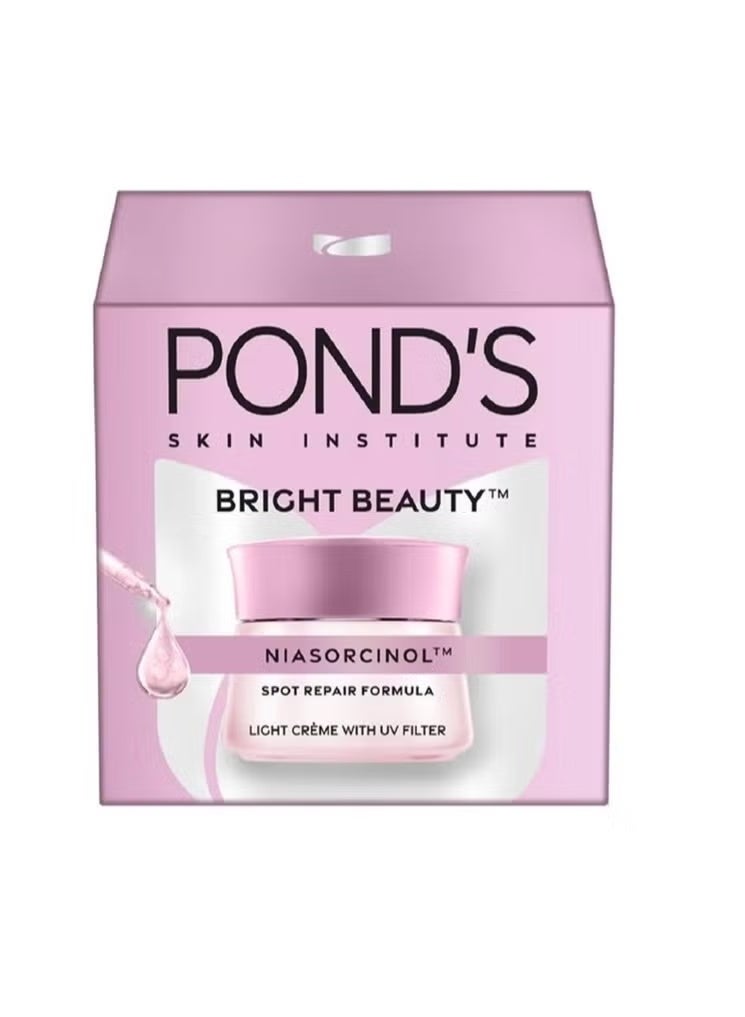 Pond's POND’s Bright Beauty Light Cream 50g | Bright Beauty Niasorcinol Cream Spot Repair Formula | Vitamin B3 Active | Fades Dark Spots, Brightens & Evens Skin Tone | With UV Filter | Lightweight Daily Face Cream - Image 2
