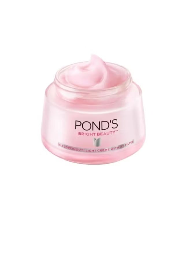 Pond's POND’s Bright Beauty Light Cream 50g | Bright Beauty Niasorcinol Cream Spot Repair Formula | Vitamin B3 Active | Fades Dark Spots, Brightens & Evens Skin Tone | With UV Filter | Lightweight Daily Face Cream - Image 4