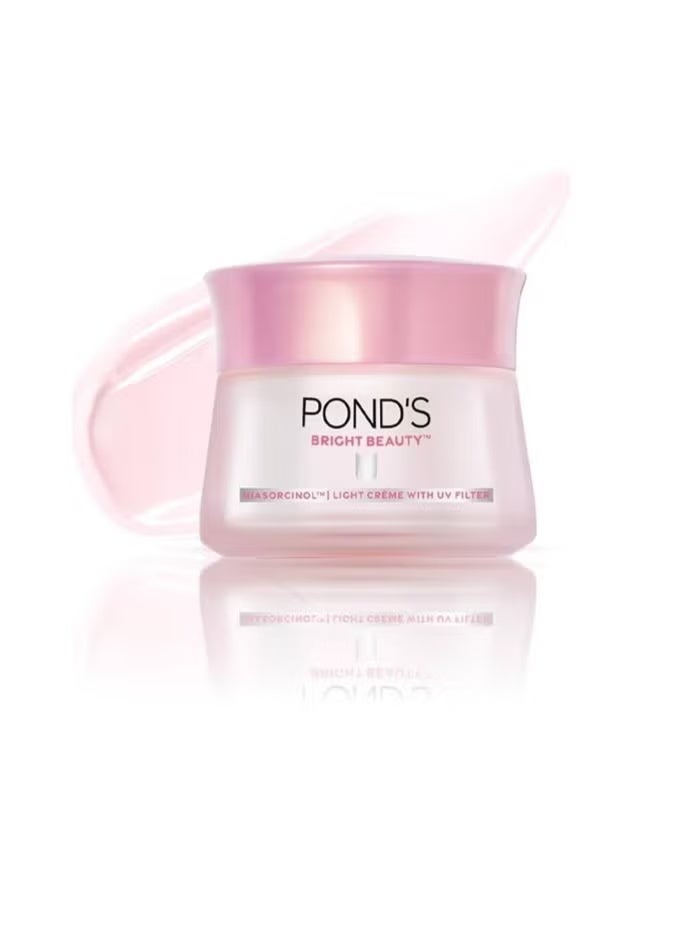 Pond's POND’s Bright Beauty Light Cream 50g | Bright Beauty Niasorcinol Cream Spot Repair Formula | Vitamin B3 Active | Fades Dark Spots, Brightens & Evens Skin Tone | With UV Filter | Lightweight Daily Face Cream - Image 3