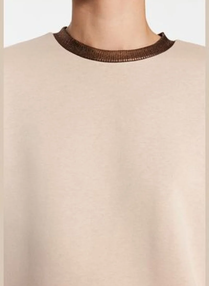 trendyol Beige Collar with Foil Print Thick Regular/Regular Pattern Knitted Sweatshirt TWOAW24SW00130.