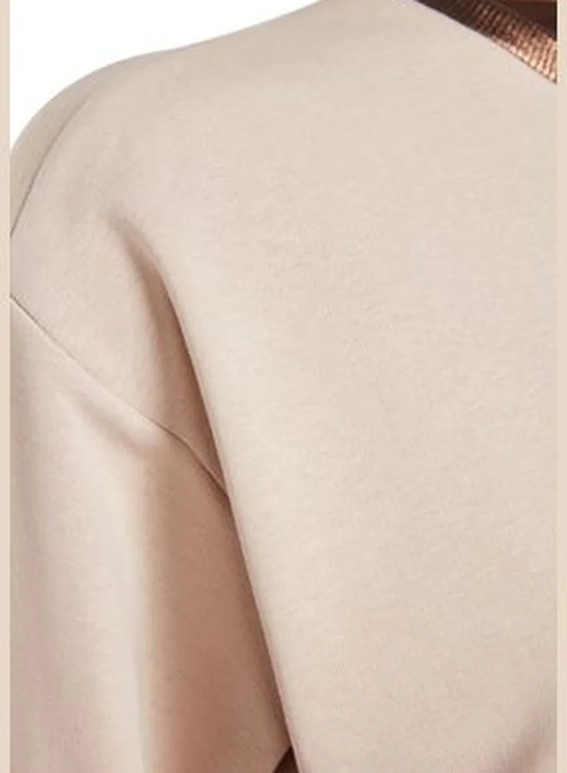 trendyol Beige Collar with Foil Print Thick Regular/Regular Pattern Knitted Sweatshirt TWOAW24SW00130.