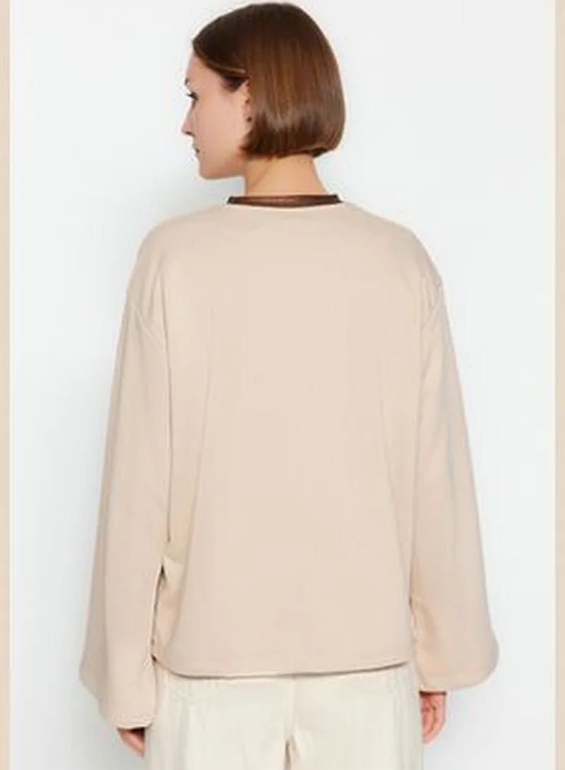 trendyol Beige Collar with Foil Print Thick Regular/Regular Pattern Knitted Sweatshirt TWOAW24SW00130.