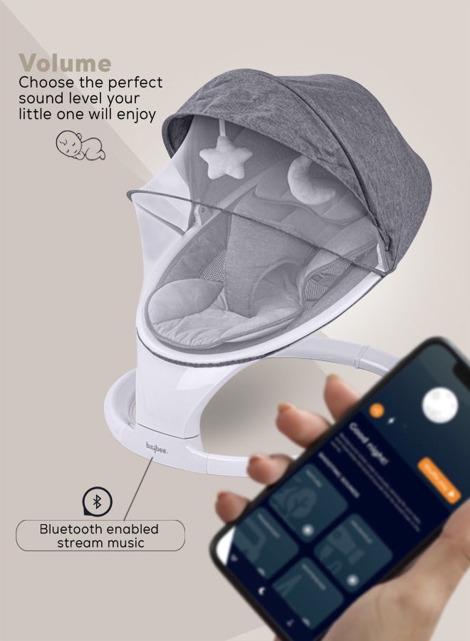 بيبي سوذ إن إس واي هزاز كهربائي للأطفال مع بلوتوث، سرعة تأرجح قابلة للتعديل، جهاز تحكم عن بُعد، لوحة لمس، موسيقى تهدئة مع اهتزازات، هزاز للأطفال مع شبكة ضد البعوض، حزام أمان وألعاب، هزاز للأطفال باللون الأبيض. - Image 2