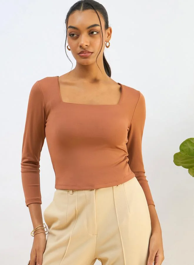 ساسافراس بلوزة قصيرة محبوكة بياقة مربعة بلون برتقالي من ساسافراس