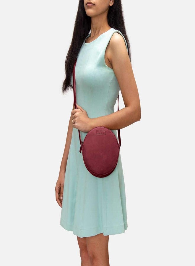 DailyObjects Orbis Round Sling Crossbody Bag For Women| Stylish Solid Burgundy Faux Leather Purse With Slip Pocket & 2 Compartments Inside| Zip Closure & Adjustable Strap| Storage Space For Essentials - Image 3