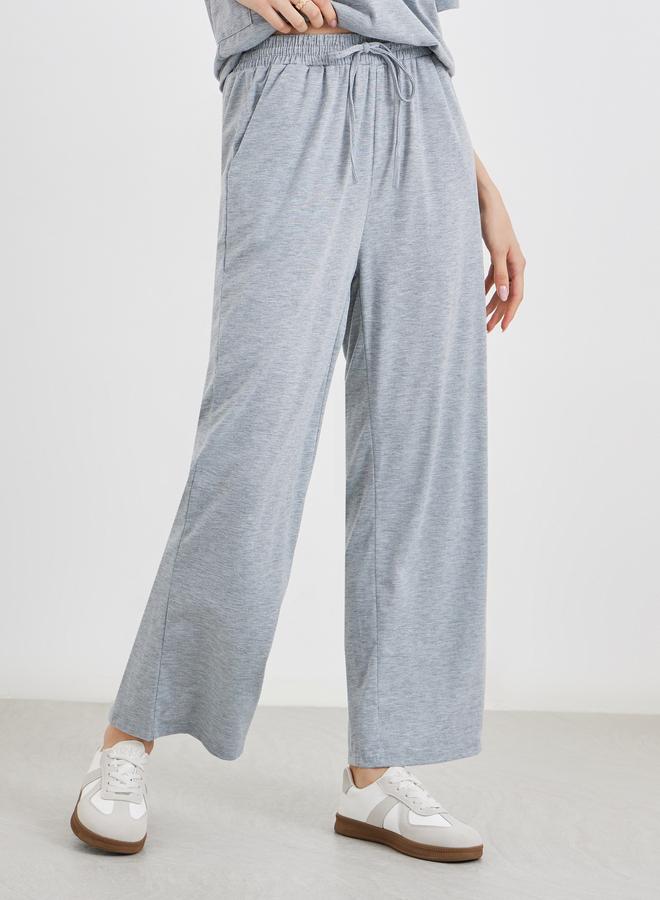 تايك تو طقم منسق من بنطال وتيشيرت سادة - Image 4