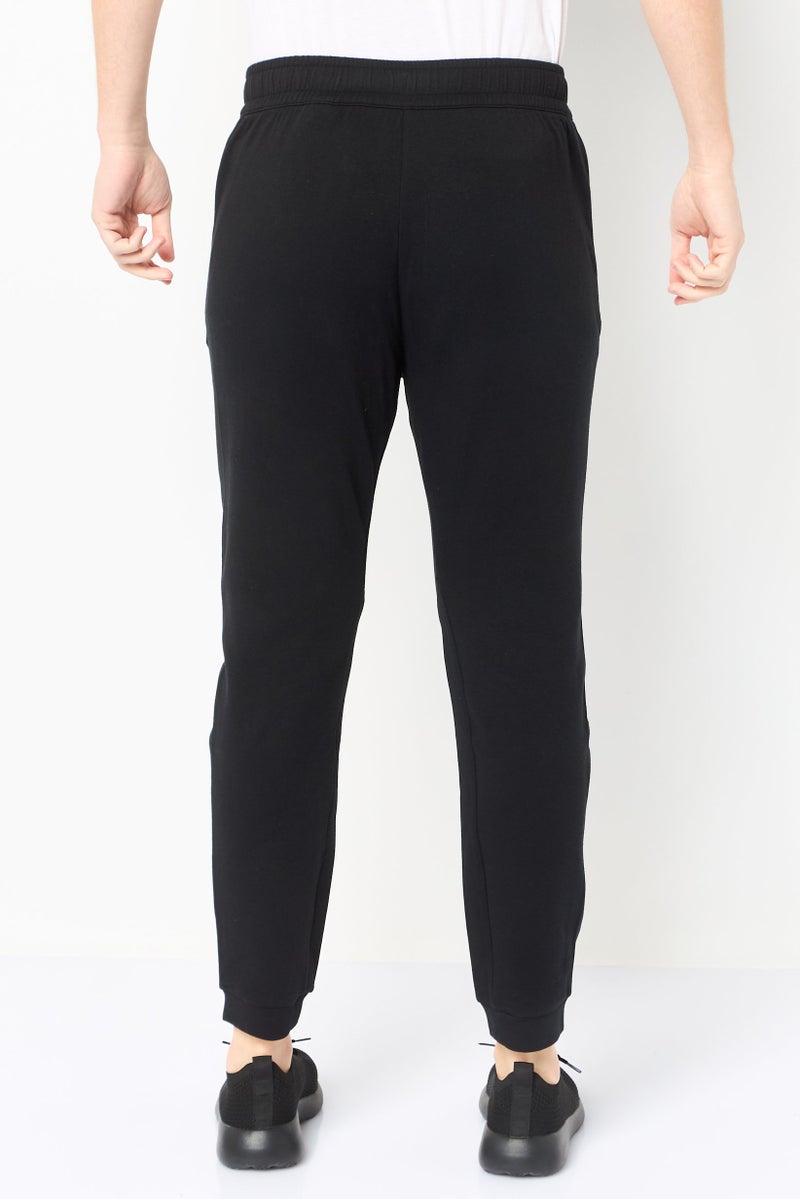 Reebok Men Sportswear Fit Outdoor Sweatpants, Black - Image 4